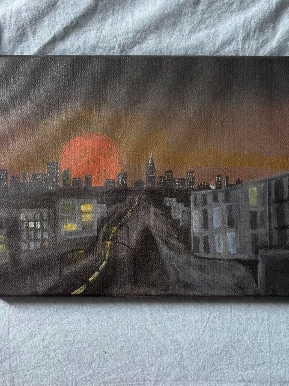Painting of the Blood Moon on recycled canvas